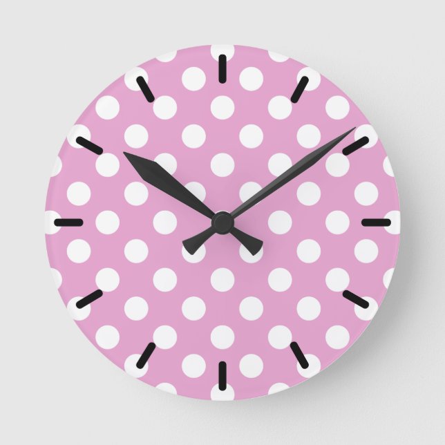 White polka dots on pale pink round clock (Front)