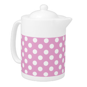 White polka dots on pale pink teapot