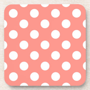 White polka dots on peach beverage coaster