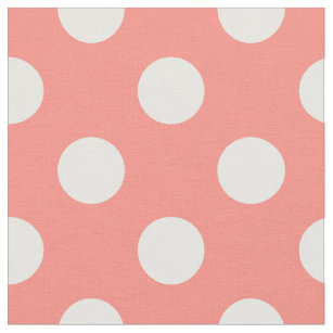 White polka dots on peach fabric
