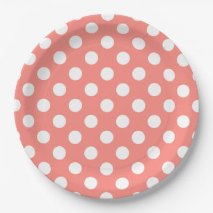 White polka dots on peach paper plates
