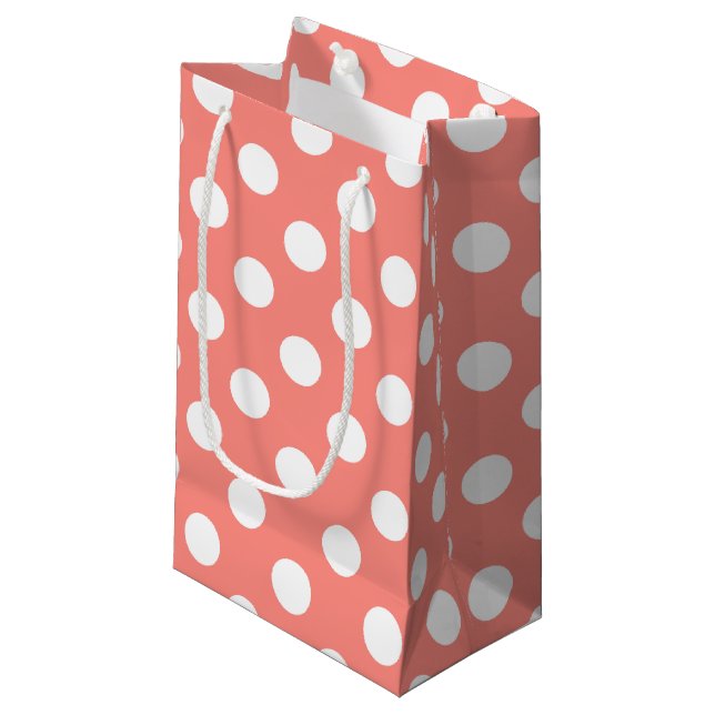 White polka dots on peach small gift bag (Front Angled)