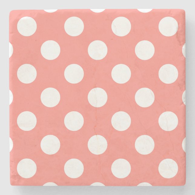 White polka dots on peach stone coaster (Front)