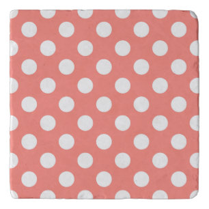 White polka dots on peach trivet