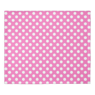 White polka dots on pink duvet cover