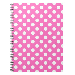 White polka dots on pink notebook