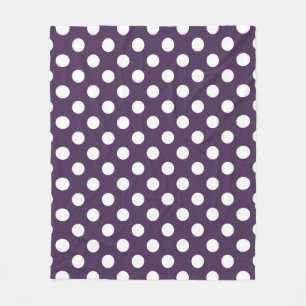 White polka dots on plum purple fleece blanket