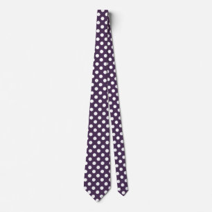 White polka dots on plum purple neck tie