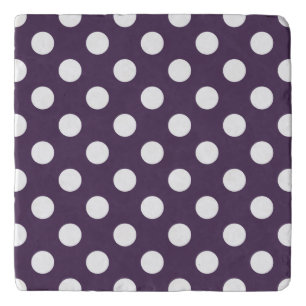 White polka dots on plum purple trivet