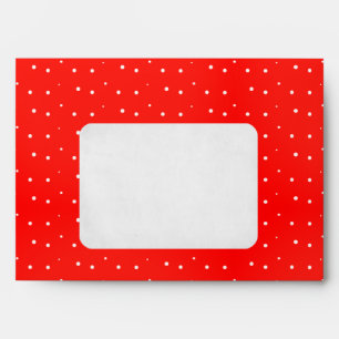 white polka dots on red envelope