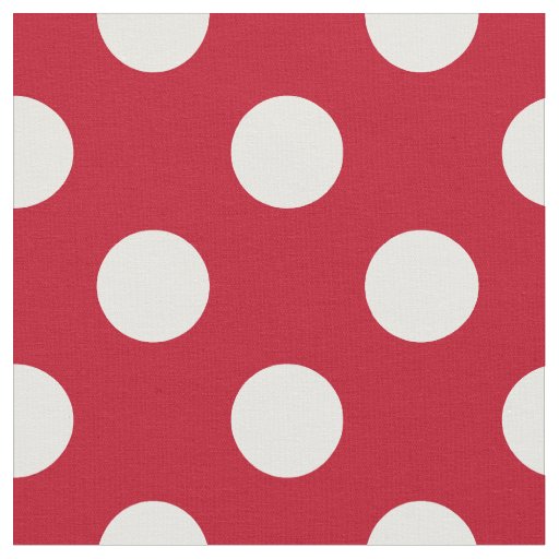 White polka dots on red fabric