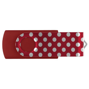 White polka dots on red flash drive