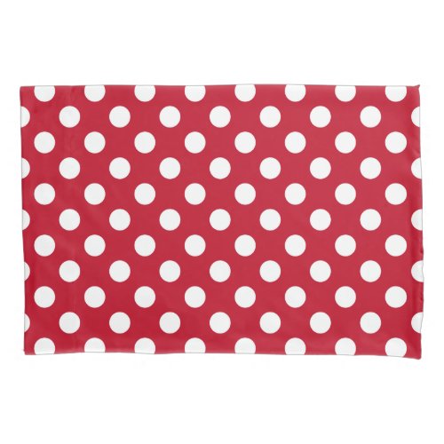 White polka dots on red pillowcase