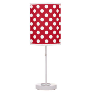 White polka dots on red table lamp