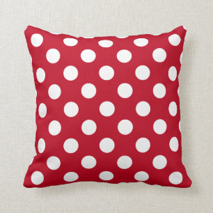 White polka dots on red throw pillow