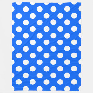 White polka dots on royal blue fleece blanket