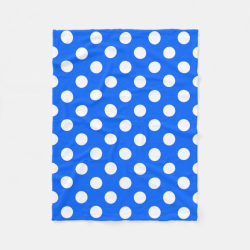 White polka dots on royal blue fleece blanket