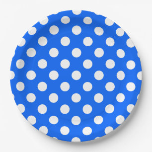 White polka dots on royal blue paper plates