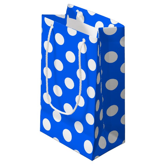 White polka dots on royal blue small gift bag (Front Angled)
