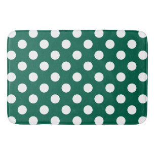 White polka dots on sage green bathroom mat