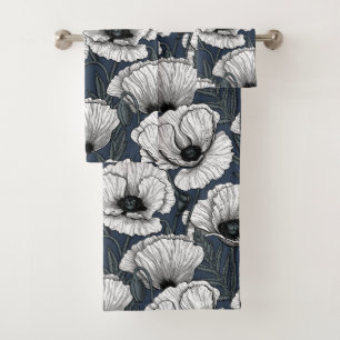 White poppies on navy bath towel set
