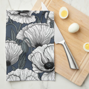 White poppies on navy kitchen towel