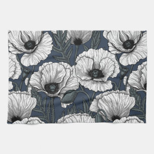 White poppies on navy kitchen towel
