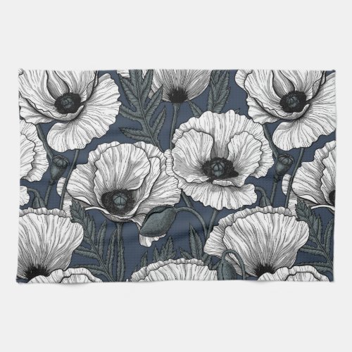 White poppies on navy kitchen towel