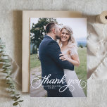 White Pretty Calligraphy Modern Photo Wedding Thank You Card<br><div class="desc">Photo Thank You Card | Thank family and friends for being part of your special day with this customizable wedding thank you card. This photo thank you card features a curly script. Personalize by adding your details. This photo wedding thank you card is available on other cardstock. Matching items are...</div>