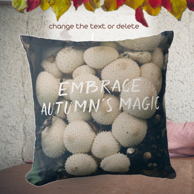 White puffball mushrooms among autumn leaves throw pillow (Creator Uploaded)