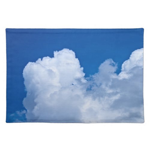 White puffy clouds in blue sky cloth placemat