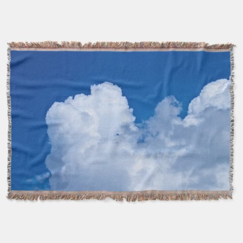 White puffy clouds in blue sky throw blanket