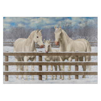 White Quarter Horses In Snow Cutting Board