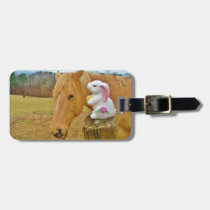 White rabbit and blond yellow horse luggage tag