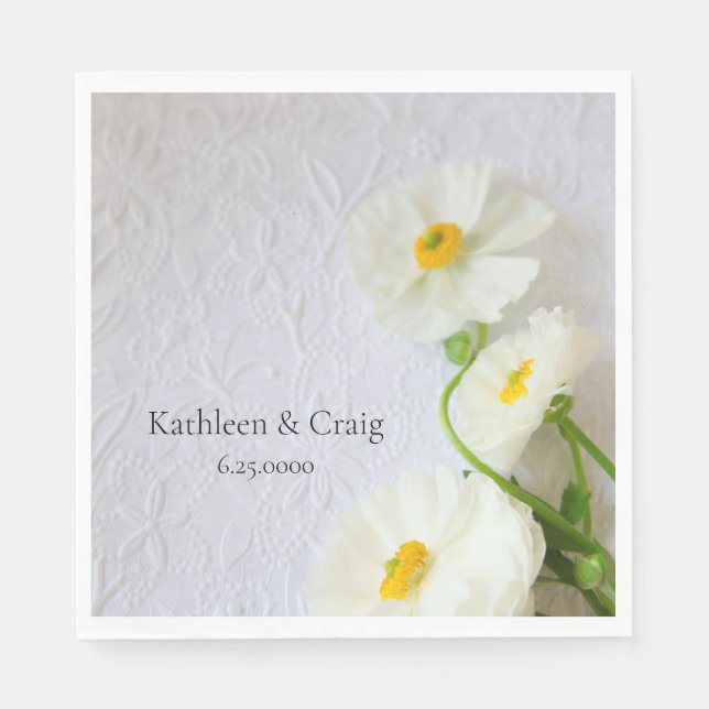 White ranunculus on textured paper napkins (Front)