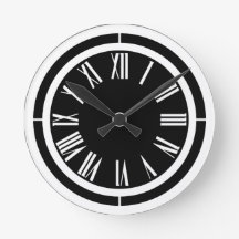 White Roman Numerals on Black Wall Clock