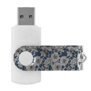 White roses with blue leaves on white flash drive