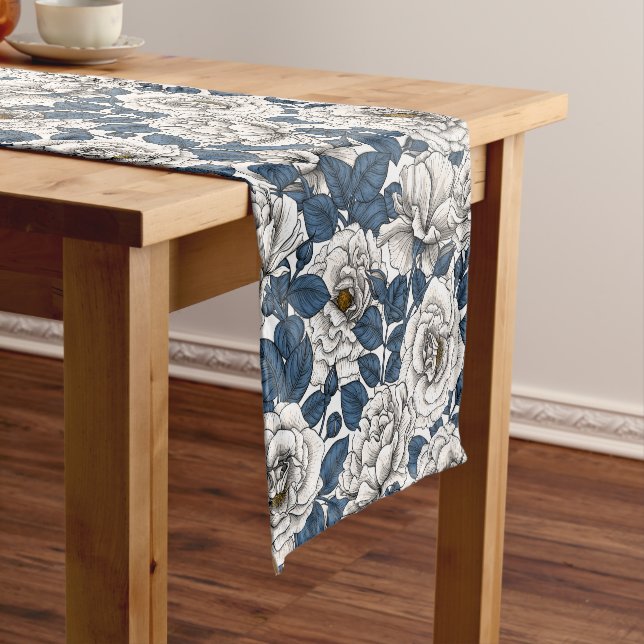 White roses with blue leaves on white short table runner (In Situ)