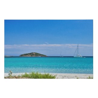 White sand beach turquoise water islet & sailboat