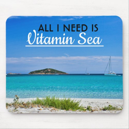 white sand beach with turquoise water and sailboat mouse pad