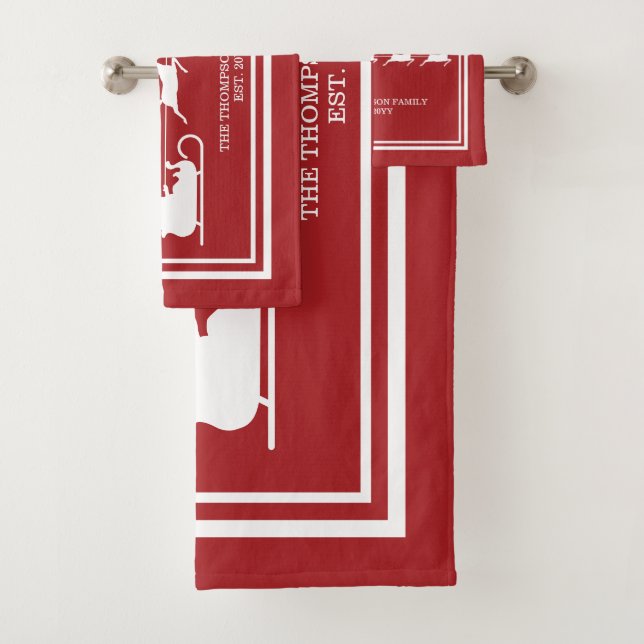 White Santa Sleigh And Merry Christmas Text On Red Bath Towel Set (Insitu)