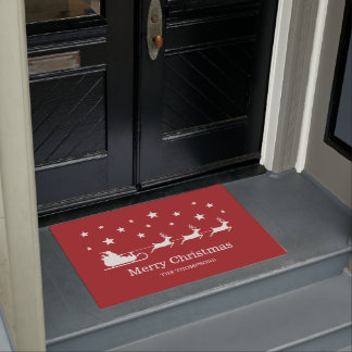 White Santa Sleigh And Merry Christmas Text On Red Doormat