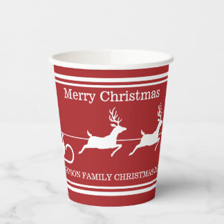 White Santa Sleigh And Merry Christmas Text On Red Paper Cups