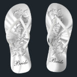 White Satin & Silver Ornate Design | Bride Flip Flops<br><div class="desc">Bridal Party Flop Shoes ready for you to personalize. If need be... you can start fresh with your own text, text color and font choices with the Zazzle design tool area. ✔Note: Not all template areas need changed. 📌If you need further customization, please click the "Click to Customize further" or...</div>