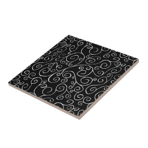 White Scrolling Curves on Black Ceramic Tile