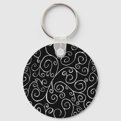 White Scrolling Curves on Black Keychain