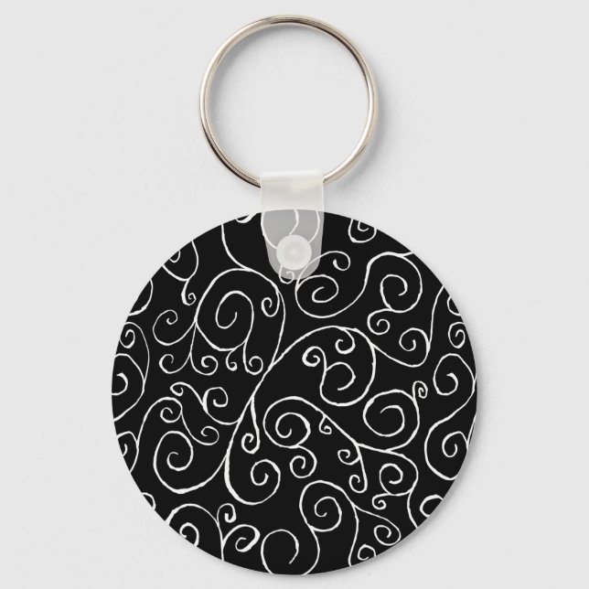 White Scrolling Curves on Black Keychain (Front)