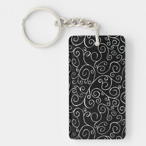 White Scrolling Curves on Black Keychain