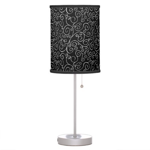 White Scrolling Curves on Black Table Lamp