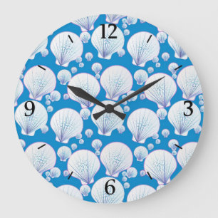 White sea shells on an ocean blue background large clock